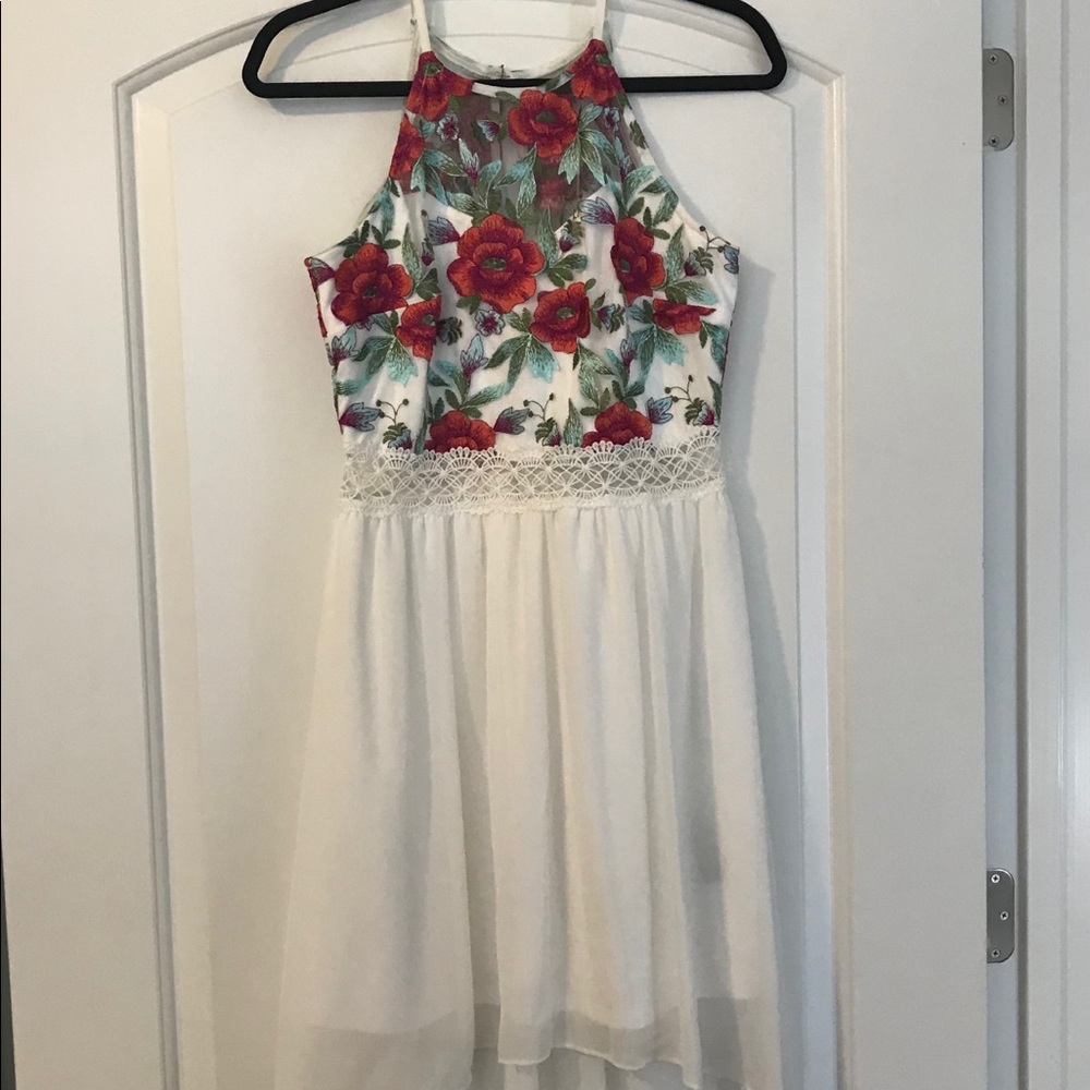 White dress with floral embroidery